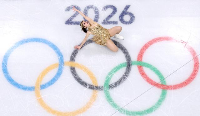 (260219) -- MILAN, Feb. 19, 2026 (Xinhua) -- Alysa Liu of the United States competes during the free skating match of figure skating women single skating at the Milan-Cortina 2026 Olympic Winter Games in Milan, Italy, Feb. 19, 2026. (Xinhua/Cheng Min)