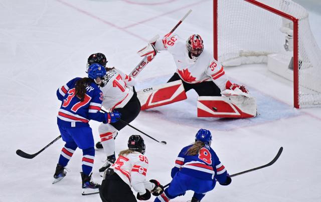 (260219) -- MILAN, Feb. 19, 2026 (Xinhua) -- Goalkeeper Ann-Renee Desbiens of Canada saves the puck during the ice hockey women's gold medal game between the United States and Canada at the Milan-Cortina 2026 Olympic Winter Games in Milan, Italy, Feb. 19, 2026. (Xinhua/Tao Xiyi)