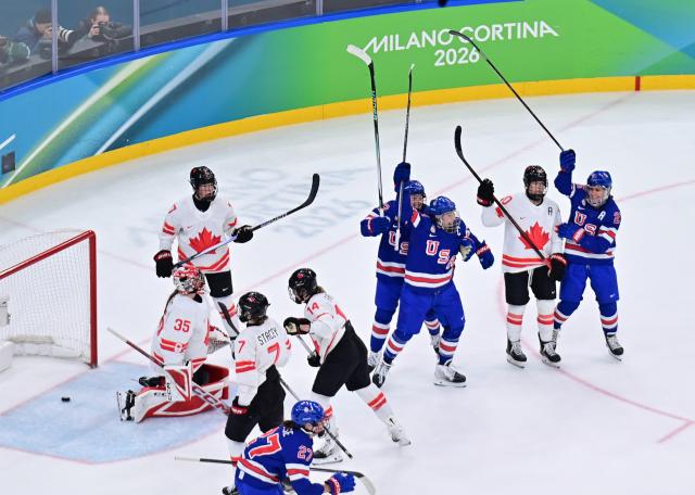(260219) -- MILAN, Feb. 19, 2026 (Xinhua) -- Players of the United States celebrate scoring during the ice hockey women's gold medal game between the United States and Canada at the Milan-Cortina 2026 Olympic Winter Games in Milan, Italy, Feb. 19, 2026. (Xinhua/Tao Xiyi)