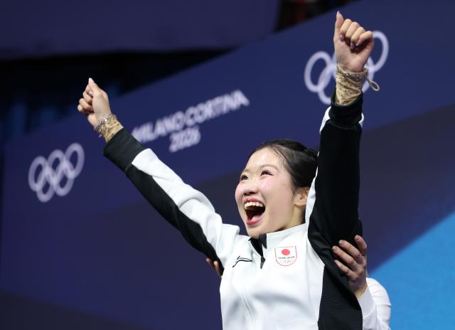 (260219) -- MILAN, Feb. 19, 2026 (Xinhua) -- Nakai Ami of Japan celebrates after the free skating match of figure skating women single skating at the Milan-Cortina 2026 Olympic Winter Games in Milan, Italy, Feb. 19, 2026. (Xinhua/Li Ming)