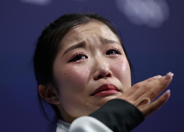 (260219) -- MILAN, Feb. 19, 2026 (Xinhua) -- Nakai Ami of Japan weeps after the free skating match of figure skating women single skating at the Milan-Cortina 2026 Olympic Winter Games in Milan, Italy, Feb. 19, 2026. (Xinhua/Li Ming)