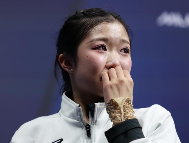 (260219) -- MILAN, Feb. 19, 2026 (Xinhua) -- Nakai Ami of Japan reacts after the free skating match of figure skating women single skating at the Milan-Cortina 2026 Olympic Winter Games in Milan, Italy, Feb. 19, 2026. (Xinhua/Li Ming)