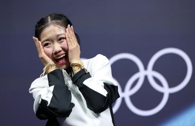 (260219) -- MILAN, Feb. 19, 2026 (Xinhua) -- Nakai Ami of Japan celebrates after the free skating match of figure skating women single skating at the Milan-Cortina 2026 Olympic Winter Games in Milan, Italy, Feb. 19, 2026. (Xinhua/Li Ming)