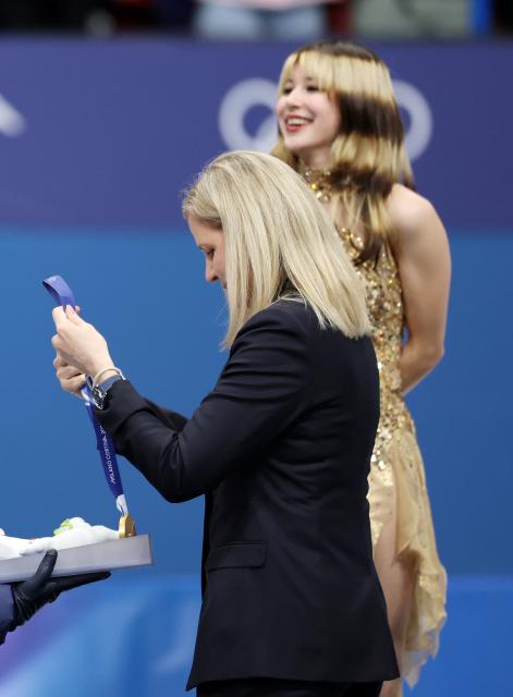 (260220) -- MILAN, Feb. 20, 2026 (Xinhua) -- International Olympic Committee (IOC) President Kirsty Coventry (front) is seen during the awarding ceremony of the figure skating women single skating event at the Milan-Cortina 2026 Olympic Winter Games in Milan, Italy, Feb. 19, 2026. (Xinhua/Li Ming)