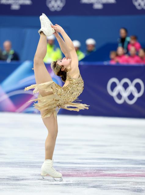 (260220) -- MILAN, Feb. 20, 2026 (Xinhua) -- Alysa Liu of the United States competes during the free skating match of figure skating women single skating at the Milan-Cortina 2026 Olympic Winter Games in Milan, Italy, Feb. 19, 2026. (Xinhua/Li Ming)