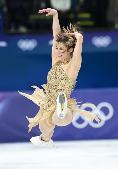 (260220) -- MILAN, Feb. 20, 2026 (Xinhua) -- Alysa Liu of the United States competes during the free skating match of figure skating women single skating at the Milan-Cortina 2026 Olympic Winter Games in Milan, Italy, Feb. 19, 2026. (Xinhua/Li Ming)