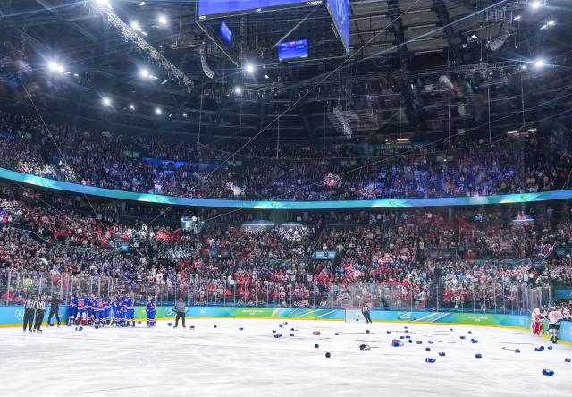 (260220) -- MILAN, Feb. 20, 2026 (Xinhua) -- Players of the United States celebrate after winning the ice hockey women's gold medal game between the United States and Canada at the Milan-Cortina 2026 Olympic Winter Games in Milan, Italy, Feb. 19, 2026. (Xinhua/Sun Fei)