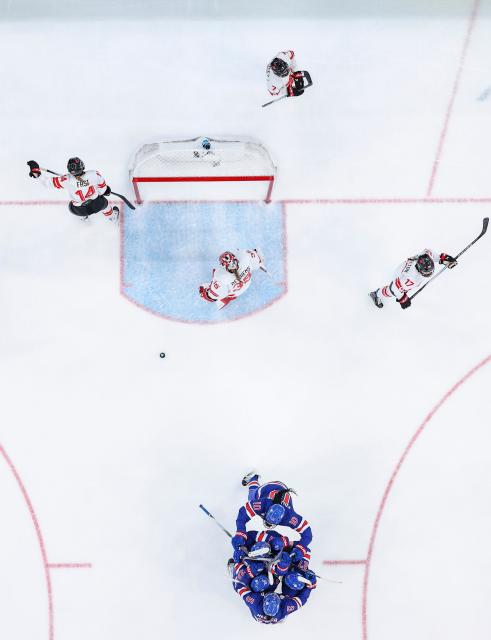 (260220) -- MILAN, Feb. 20, 2026 (Xinhua) -- Players of the United States celebrate a goal during the ice hockey women's gold medal game between the United States and Canada at the Milan-Cortina 2026 Olympic Winter Games in Milan, Italy, Feb. 19, 2026. (Xinhua/Sun Fei)