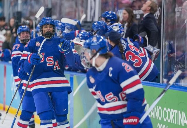 (260220) -- MILAN, Feb. 20, 2026 (Xinhua) -- Players of the United States celebrate a goal during the ice hockey women's gold medal game between the United States and Canada at the Milan-Cortina 2026 Olympic Winter Games in Milan, Italy, Feb. 19, 2026. (Xinhua/Sun Fei)