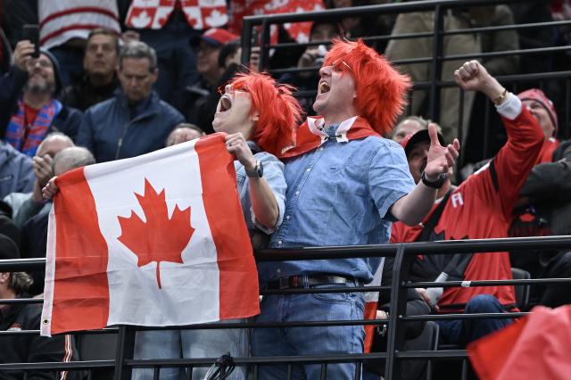(260220) -- MILAN, Feb. 20, 2026 (Xinhua) -- Fans of Canada react during the ice hockey women's gold medal game between the United States and Canada at the Milan-Cortina 2026 Olympic Winter Games in Milan, Italy, Feb. 19, 2026. (Xinhua/Zhang Haofu)