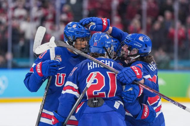 (260220) -- MILAN, Feb. 20, 2026 (Xinhua) -- Players of the United States celebrate a goal during the ice hockey women's gold medal game between the United States and Canada at the Milan-Cortina 2026 Olympic Winter Games in Milan, Italy, Feb. 19, 2026. (Xinhua/Sun Fei)