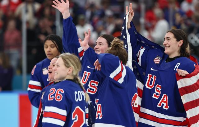 (260220) -- MILAN, Feb. 20, 2026 (Xinhua) -- Players the United States greet fans after winning the ice hockey women's gold medal game between the United States and Canada at the Milan-Cortina 2026 Olympic Winter Games in Milan, Italy, Feb. 19, 2026. (Xinhua/Wang Kaiyan)