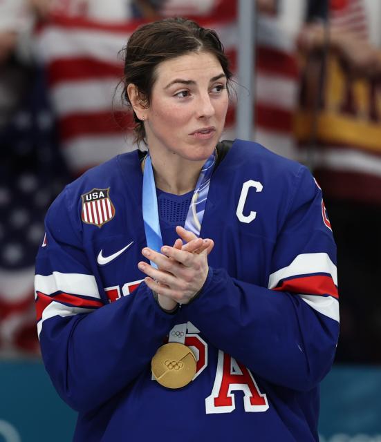 (260220) -- MILAN, Feb. 20, 2026 (Xinhua) -- Hilary Knight of the United States reacts during the awarding ceremony after the ice hockey women's gold medal game between the United States and Canada at the Milan-Cortina 2026 Olympic Winter Games in Milan, Italy, Feb. 19, 2026. (Xinhua/Wang Kaiyan)