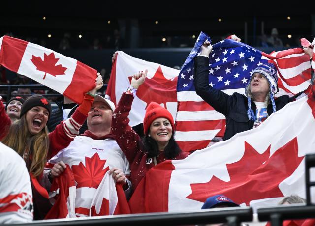 (260220) -- MILAN, Feb. 20, 2026 (Xinhua) -- Spectators react during the ice hockey women's gold medal game between the United States and Canada at the Milan-Cortina 2026 Olympic Winter Games in Milan, Italy, Feb. 19, 2026. (Xinhua/Zhang Haofu)