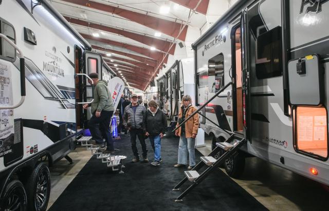 (260220) -- ABBOTSFORD, Feb. 20, 2026 (Xinhua) -- People attend the 2026 Earlybird RV (recreational vehicles) Show & Sale in Abbotsford, British Columbia, Canada, on Feb. 19, 2026. The four-day event kicked off here on Thursday. (Photo by Liang Sen/Xinhua)