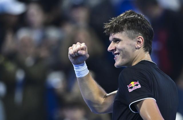 (260220) -- DOHA, Feb. 20, 2026 (Xinhua) -- Jakub Mensik of the Czech Republic celebrates after winning the men's singles quarterfinal match between Jannik Sinner of Italy and Jakub Mensik of the Czech Republic at the ATP Qatar Open 2026 tennis tournament in Doha, Qatar, Feb. 19, 2026. (Photo by Nikku/Xinhua)
