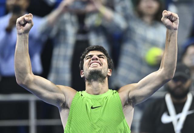(260220) -- DOHA, Feb. 20, 2026 (Xinhua) -- Carlos Alcaraz of Spain celebrates after winning the men's singles quarterfinal match between Carlos Alcaraz of Spain and Karen Khachanov of Russia at the ATP Qatar Open 2026 tennis tournament in Doha, Qatar, Feb. 19, 2026. (Photo by Nikku/Xinhua)