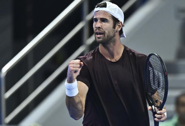 (260220) -- DOHA, Feb. 20, 2026 (Xinhua) -- Karen Khachanov of Russia reacts during the men's singles quarterfinal match between Carlos Alcaraz of Spain and Karen Khachanov of Russia at the ATP Qatar Open 2026 tennis tournament in Doha, Qatar, Feb. 19, 2026. (Photo by Nikku/Xinhua)
