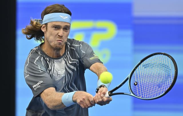 (260220) -- DOHA, Feb. 20, 2026 (Xinhua) -- Andrey Rublev of Russia hits a return during the men's singles quarterfinal match between Andrey Rublev of Russia and Stefanos Tsitsipas of Greece at the ATP Qatar Open 2026 tennis tournament in Doha, Qatar, Feb. 19, 2026. (Photo by Nikku/Xinhua)