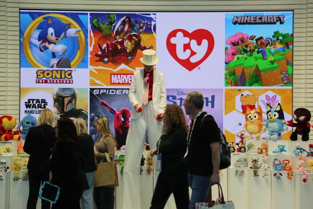 (260220) -- NEW YORK, Feb. 20, 2026 (Xinhua) -- Visitors walk past the booth of Ty Inc. at Toy Fair 2026 in New York City, the United States, on Feb. 15, 2026. TO GO WITH "Feature: Tariff hikes continue to bite into U.S. toy industry, consumers" (Xinhua/Liu Yanan)