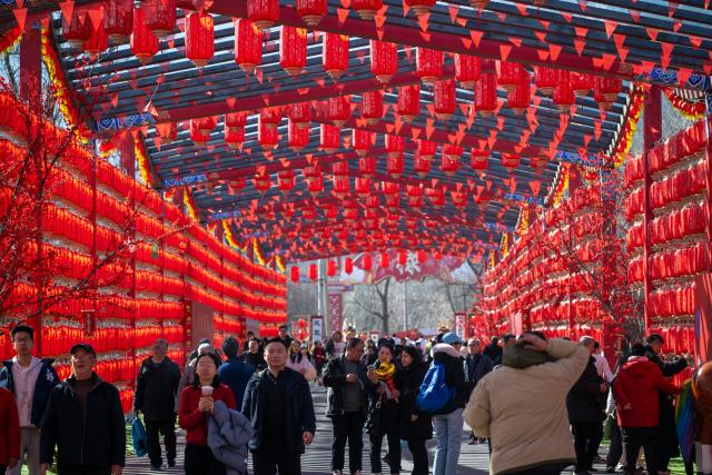 (260220) -- BEIJING, Feb. 20, 2026 (Xinhua) -- Tourists visit a fair in Haidian District of Beijing, capital of China, Feb. 19, 2026. China's Ministry of Culture and Tourism launched a month-long cultural and tourism campaign ahead of the Spring Festival, featuring a wide range of activities and promotional measures to better meet people's needs.
   Running from late January to early March, the campaign will see about 30,000 activities held nationwide, offering seasonal cultural and tourism products and events focused on traditional New Year customs, performances, and exhibitions.
   More than 360 million yuan (about 51.6 million U.S. dollars) in consumption vouchers and subsidies will be distributed, alongside measures such as ticket discounts, bundled ticket incentives, and cross-regional tourism promotions. (Xinhua/Hu Jingwen)