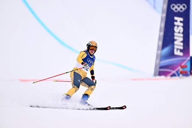 (260220) -- LIVIGNO, Feb. 20, 2026 (Xinhua) -- Daniela Maier of Germany reacts after crossing the finish line during the freestyle skiing women's ski cross seeding at the Milan-Cortina 2026 Olympic Winter Games in Livigno, Italy, Feb. 20, 2026. (Xinhua/Zhang Hongxiang)