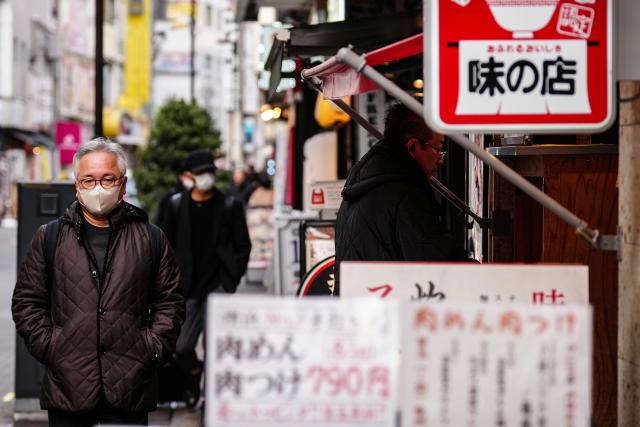 (260220) -- TOKYO, Feb. 20, 2026 (Xinhua) -- A man buys meal vouchers in front of a restaurant in Tokyo, Japan, Feb. 20, 2026. Japan's core consumer prices in January increased 2.0 percent from a year earlier, marking a two-year low and matching the central bank's inflation target, government data showed Friday.
   The increase in the core consumer price index (CPI), excluding volatile fresh food costs, slowed from a 2.4 percent gain in December, according to the Ministry of Internal Affairs and Communications. (Xinhua/Jia Haocheng)