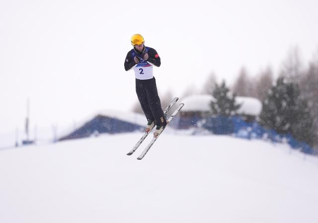(260220) -- LIVIGNO, Feb. 20, 2026 (Xinhua) -- Li Tianma of China competes during the freestyle skiing men's aerials final 1 at the Milan-Cortina 2026 Olympic Winter Games in Livigno, Italy, Feb. 20, 2026. (Xinhua/Hu Chao)