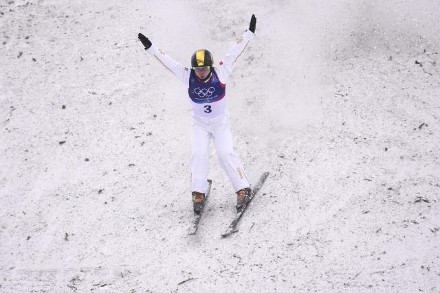 (260220) -- LIVIGNO, Feb. 20, 2026 (Xinhua) -- Qi Guangpu of China competes during the freestyle skiing men's aerials final 1 at the Milan-Cortina 2026 Olympic Winter Games in Livigno, Italy, Feb. 20, 2026. (Xinhua/Hu Chao)