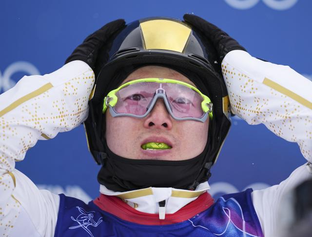 (260220) -- LIVIGNO, Feb. 20, 2026 (Xinhua) -- Qi Guangpu of China reacts during the freestyle skiing men's aerials final 1 at the Milan-Cortina 2026 Olympic Winter Games in Livigno, Italy, Feb. 20, 2026. (Xinhua/Wu Huiwo)