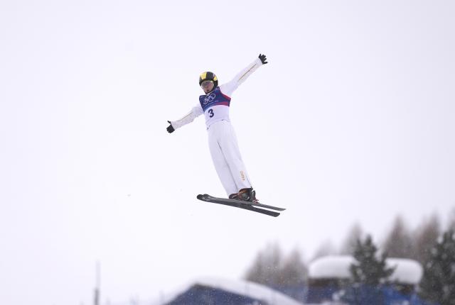 (260220) -- LIVIGNO, Feb. 20, 2026 (Xinhua) -- Qi Guangpu of China competes during the freestyle skiing men's aerials final 1 at the Milan-Cortina 2026 Olympic Winter Games in Livigno, Italy, Feb. 20, 2026. (Xinhua/Hu Chao)