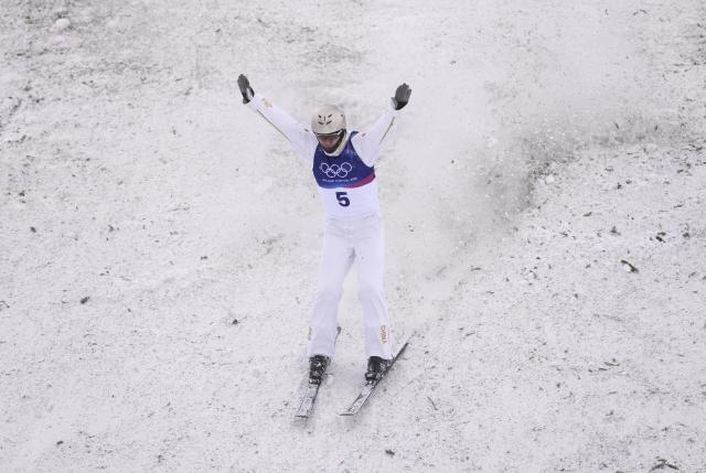 (260220) -- LIVIGNO, Feb. 20, 2026 (Xinhua) -- Wang Xindi of China competes during the freestyle skiing men's aerials final 1 at the Milan-Cortina 2026 Olympic Winter Games in Livigno, Italy, Feb. 20, 2026. (Xinhua/Hu Chao)