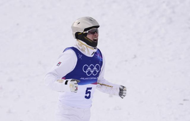 (260220) -- LIVIGNO, Feb. 20, 2026 (Xinhua) -- Gold medalist Wang Xindi of China celebrates winning after the freestyle skiing men's aerials final 2 at the Milan-Cortina 2026 Olympic Winter Games in Livigno, Italy, Feb. 20, 2026. (Xinhua/Hu Chao)