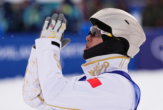 (260220) -- LIVIGNO, Feb. 20, 2026 (Xinhua) -- Gold medalist Wang Xindi of China celebrates winning after the freestyle skiing men's aerials final 2 at the Milan-Cortina 2026 Olympic Winter Games in Livigno, Italy, Feb. 20, 2026. (Xinhua/Wu Huiwo)