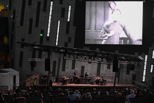(260220) -- MELBOURNE, Feb. 20, 2026 (Xinhua) -- Audiences watch The Goddess, the 1934 classic Chinese silent movie, at the Federation Square in Melbourne, Australia, on Feb. 20, 2026. This is the last silent movie shown here from Feb. 16 to 20. (Xinhua/Xu Haijing)