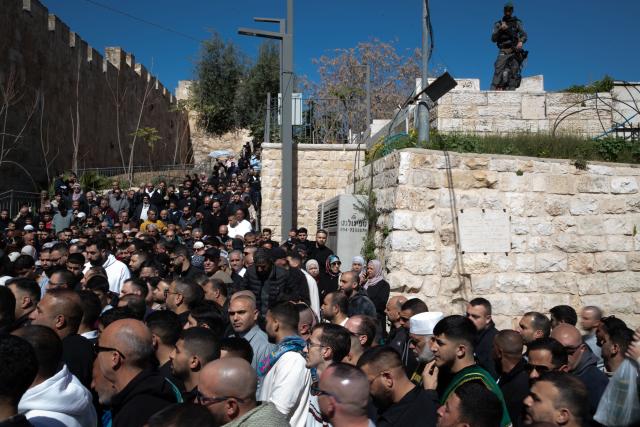 (260220) -- JERUSALEM, Feb. 20, 2026 (Xinhua) -- Palestinians walk toward the Al-Aqsa Mosque compound to attend the first Friday prayers of the holy month of Ramadan in Jerusalem's Old City, Feb. 20, 2026. Israeli authorities tightened security in Jerusalem on the first Friday of Ramadan, capping West Bank worshippers' access to the Al-Aqsa Mosque compound at 10000. (Xinhua/Chen Junqing)