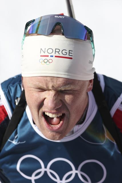 (260220) -- ANTERSELVA, Feb. 20, 2026 (Xinhua) -- Johannes Dale-Skjevdal of Norway celebrates after the biathlon men's 15km mass start event at the 2026 Milan-Cortina Winter Olympics in Anterselva, Italy, Feb. 20, 2026. (Xinhua/Zhang Tao)