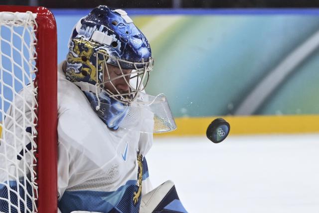 (260220) -- MILAN, Feb. 20, 2026 (Xinhua) -- Goalkeeper Juuse Saros of Finland reacts during the ice hockey men's play-offs quarterfinal between Canada and Finland at the Milan-Cortina 2026 Olympic Winter Games in Milan, Italy, Feb. 20, 2026. (Xinhua/Zhang Haofu)