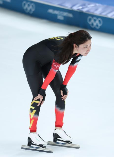 (260220) -- MILAN, Feb. 20, 2026 (Xinhua) -- Han Mei of China reacts after the speed skating women's 1500m event at the Milan-Cortina 2026 Olympic Winter Games in Milan, Italy, Feb. 20, 2026. (Xinhua/Li Jing)