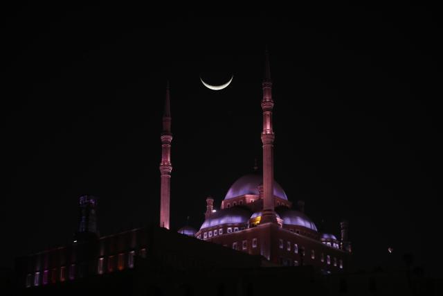 (260220) -- CAIRO, Feb. 20, 2026 (Xinhua) -- A crescent moon is seen over the Saladin Citadel on the second day of the holy month of Ramadan in Cairo, Egypt, Feb. 20, 2026. (Xinhua/Ahmed Gomaa)