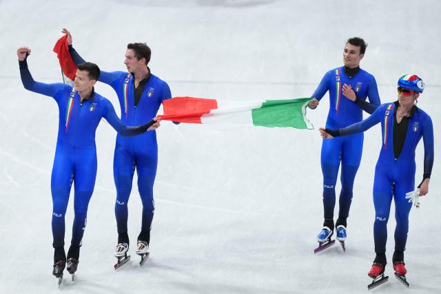 (260220) -- MILAN, Feb. 20, 2026 (Xinhua) -- Athletes of Italy celebrate after the short track speed skating men's 5000m relay final A at the Milan-Cortina 2026 Olympic Winter Games in Milan, Italy, Feb. 20, 2026. (Xinhua/Xue Yuge)
