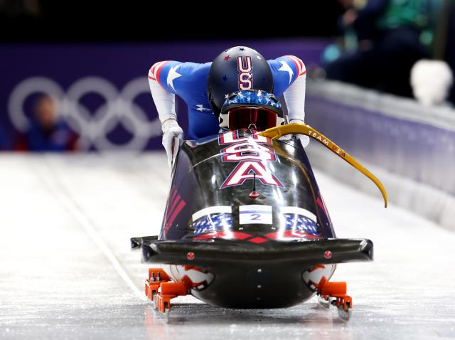 (260220) -- CORTINA D'AMPEZZO, Feb. 20, 2026 (Xinhua) -- Kaillie Armbruster Humphries/Jasmine Jones of the United States compete during the Bobsleigh 2-woman heat 1 at the 2026 Milan-Cortina Winter Olympics in Cortina D'Ampezzo, Italy, Feb. 20, 2026. (Xinhua/Ding Xu)