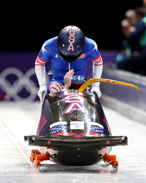 (260220) -- CORTINA D'AMPEZZO, Feb. 20, 2026 (Xinhua) -- Kaillie Armbruster Humphries/Jasmine Jones of the United States compete during the Bobsleigh 2-woman heat 1 at the 2026 Milan-Cortina Winter Olympics in Cortina D'Ampezzo, Italy, Feb. 20, 2026. (Xinhua/Ding Xu)