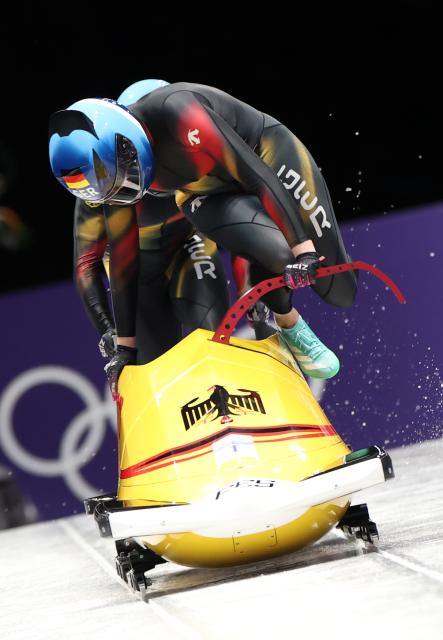 (260220) -- CORTINA D'AMPEZZO, Feb. 20, 2026 (Xinhua) -- Laura Nolte/Deborah Levi of Germany compete during the Bobsleigh 2-woman heat 1 at the 2026 Milan-Cortina Winter Olympics in Cortina D'Ampezzo, Italy, Feb. 20, 2026. (Xinhua/Ding Xu)