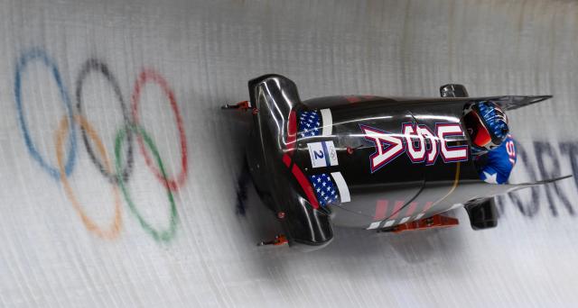 (260220) -- CORTINA D'AMPEZZO, Feb. 20, 2026 (Xinhua) -- Kaillie Armbruster Humphries/Jasmine Jones of the United States compete during the Bobsleigh 2-woman heat 2 at the 2026 Milan-Cortina Winter Olympics in Cortina D'Ampezzo, Italy, Feb. 20, 2026. (Xinhua/Fei Maohua)