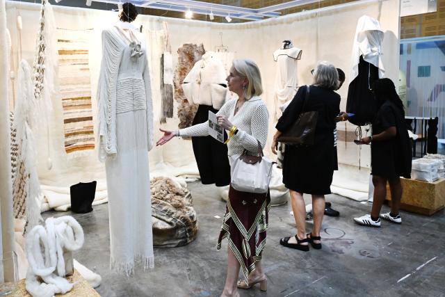 (260221) -- CAPE TOWN, Feb. 21, 2026 (Xinhua) -- People visit the Cape Town Art Fair 2026 at the Cape Town International Convention Center in Cape Town, South Africa, Feb. 20, 2026.
  The Cape Town Art Fair 2026 kicked off here on Friday. This year's edition takes place from Feb. 20 to 22 at the Cape Town International Convention Center, featuring 126 exhibitors from 34 global cities and showcasing works by more than 490 artists, with over 30,000 visitors expected. (Photo by Xabiso Mkhabela/Xinhua)