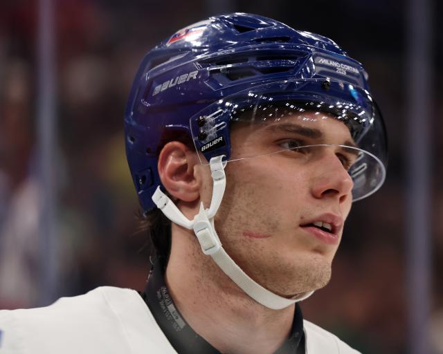 (260221) -- MILAN, Feb. 21, 2026 (Xinhua) -- Juraj Slafkovsky of Slovakia reacts during the ice hockey men's play-offs semifinal match between the United States and Slovakia at the Milan-Cortina 2026 Olympic Winter Games in Milan, Italy, Feb. 20, 2026. (Xinhua/Wang Kaiyan)