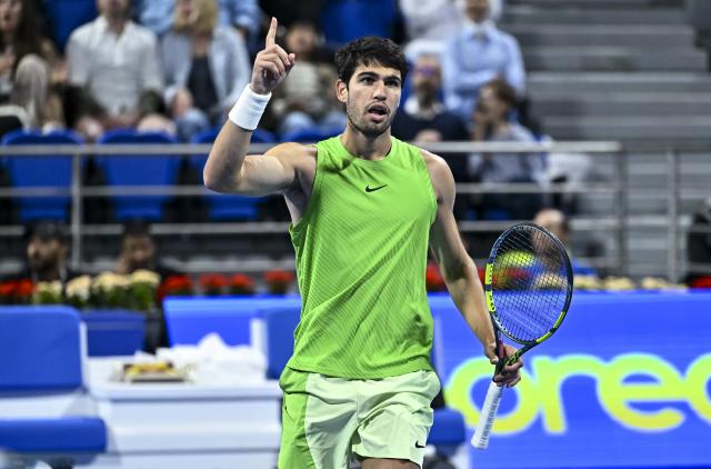 (260221) -- DOHA, Feb. 21, 2026 (Xinhua) -- Carlos Alcaraz celebrates after winning the men's singles semi-final match between Carlos Alcaraz of Spain and Andrey Rublev of Russia at the ATP Qatar Open 2026 tennis tournament in Doha, Qatar, on Feb. 20, 2026. (Photo by Nikku/Xinhua)