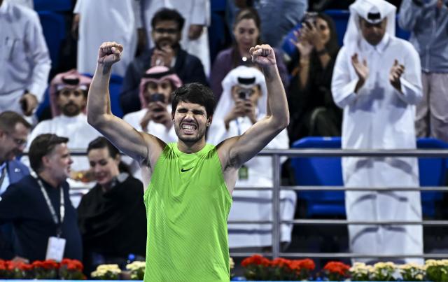 (260221) -- DOHA, Feb. 21, 2026 (Xinhua) -- Carlos Alcaraz celebrates after winning the men's singles semi-final match between Carlos Alcaraz of Spain and Andrey Rublev of Russia at the ATP Qatar Open 2026 tennis tournament in Doha, Qatar, on Feb. 20, 2026. (Photo by Nikku/Xinhua)