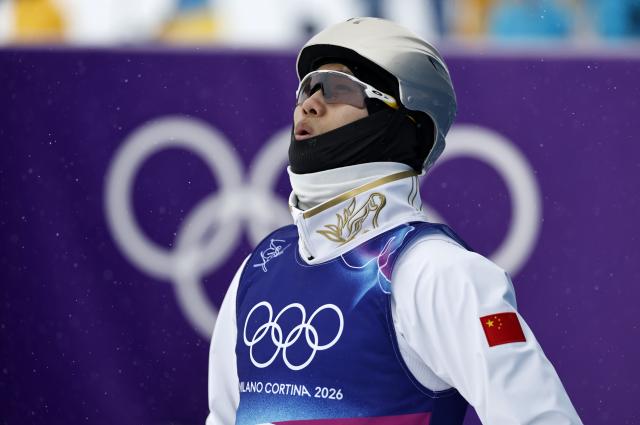 (260221) -- LIVIGNO, Feb. 21, 2026 (Xinhua) -- Wang Xindi of China reacts during the freestyle skiing mixed team aerials final 1 at the Milan-Cortina 2026 Olympic Winter Games in Livigno, Italy, Feb. 21, 2026. (Xinhua/Wang Peng)